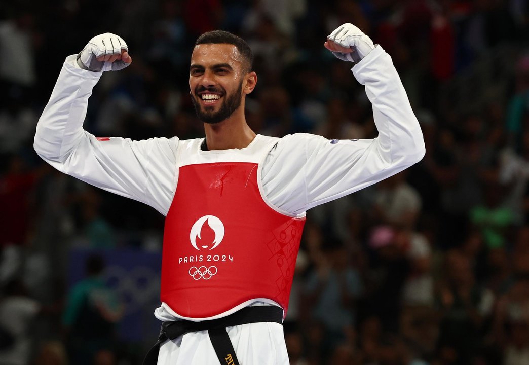 El tunecino Fira Katoussi se proclamó este viernes campeón olímpico en la categoría -80 kilos de taekwondo de París 2024. EFE/EPA/DIVYAKANT SOLANKI